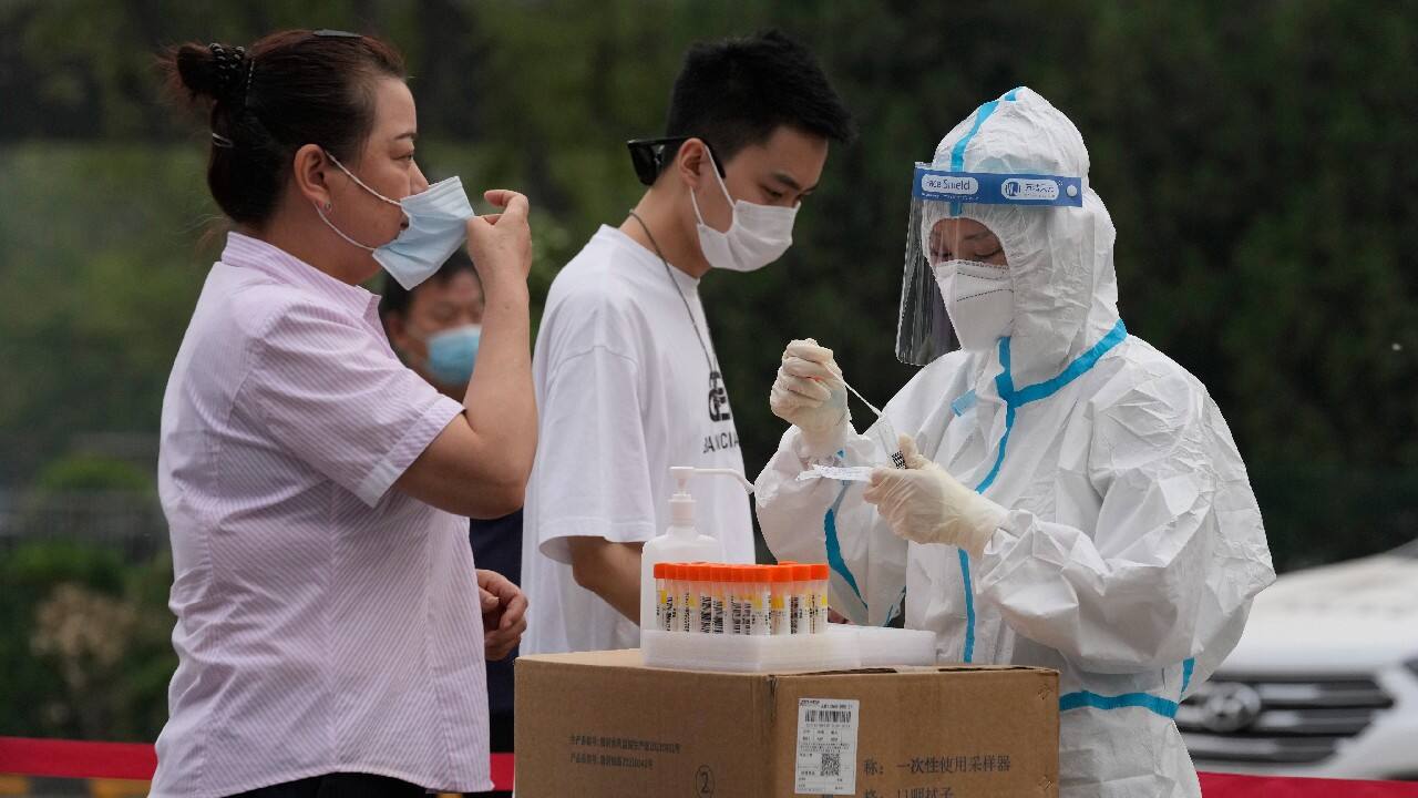 Nearly all of Beijing to get Covid by end of January, study finds