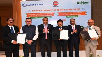 Shrikant Madhav Vaidya, Chairman, IndianOil, (2nd from Left), Sumant Sinha, Chairman and CEO of ReNew Power and SN Subrahmanyan, CEO & MD, L&T, (5th from left), along with senior company officials at the JV agreement signing in New Delhi