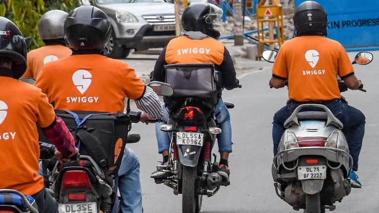 Swiggy rolls out accelerator to help delivery executives flip collars from blue to white Swiggy rolls out accelerator to help delivery executives flip collars from blue to white