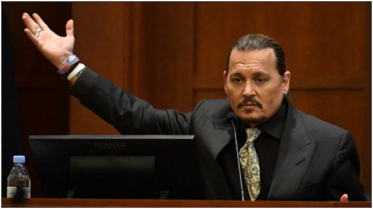 US actor Johnny Depp testifies during his defamation trial in the Fairfax County Circuit Courthouse in Fairfax, Virginia, on April 19, 2022. 