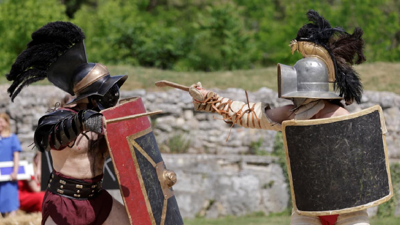 Members of the &quot;Familia Gladiatoria Carnuntina&quot; fight in the historic amphitheatre during the Gladiator Festival at the archeological site of Carnuntum in Petronell, Austria, May 26. (Image: Reuters)