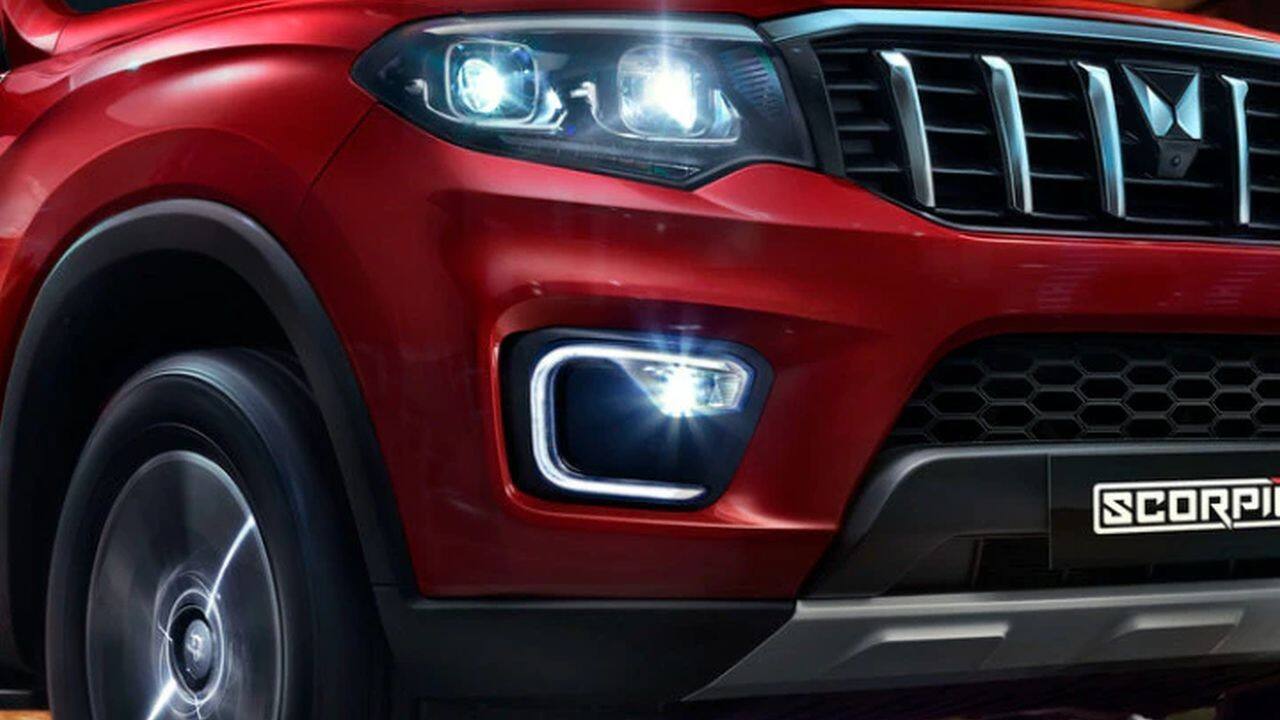 Moving on to the interiors, again, no pictures have been officially released. Spy images are a plenty, however, and a more recent sighting gives us a gist of what to expect. An all-new dashboard layout seems to be on the cards finished in a two-tone black and brown with silver highlights as garnish. The centre of the dash features a large touchscreen infotainment screen flanked by the AC vents and switches below. The SUV also gets two USB ports, a manual parking lever, cup holders, dual-zone climate control. Behind the multi-function steering wheel, the spy shot also confirms a digital instrument cluster. There are plenty of features to talk about with the new Scorpio. We are expecting things like hill descent control, traction control, multiple drive modes, parking sensors, LED cabin lighting, rear AC vents and blower controls as well as a rear USB port. The Scorpio-N will get be available in a 6-seater and a 7-seater layout which means either a bench or two captain seats for the middle row. (Image: auto.mahindra.com)