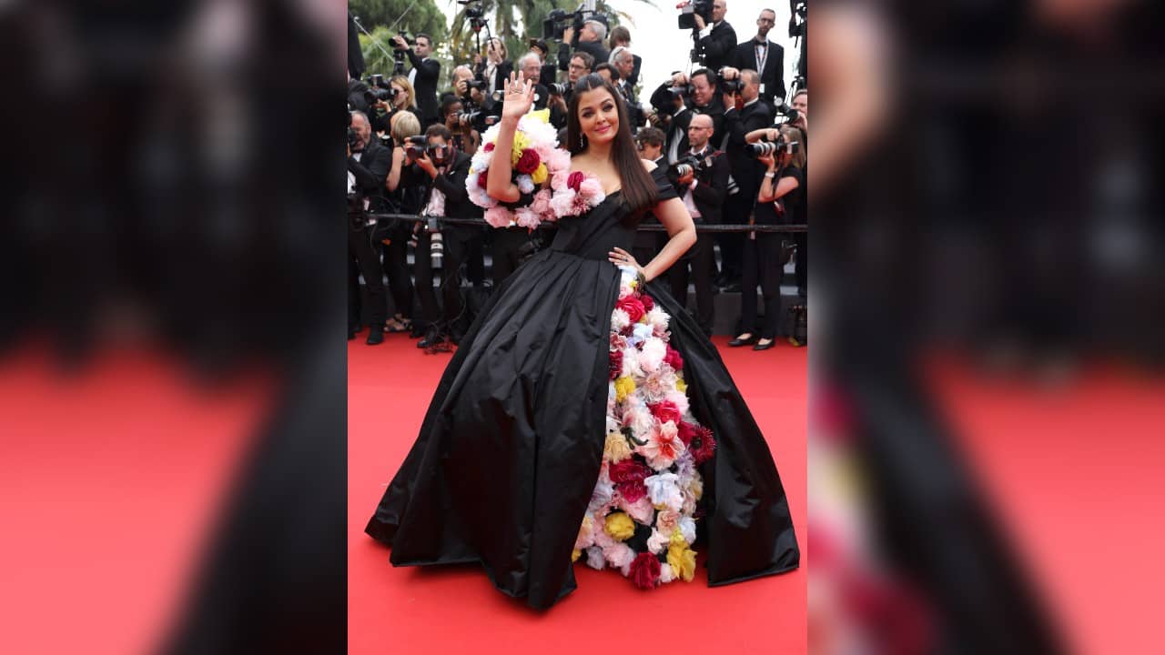 Aishwarya Rai Bachchan poses for photographers upon arrival at the premiere of the film 'Top Gun: Maverick' at the 75th international film festival, Cannes, southern France, May 18. (Image: AP)