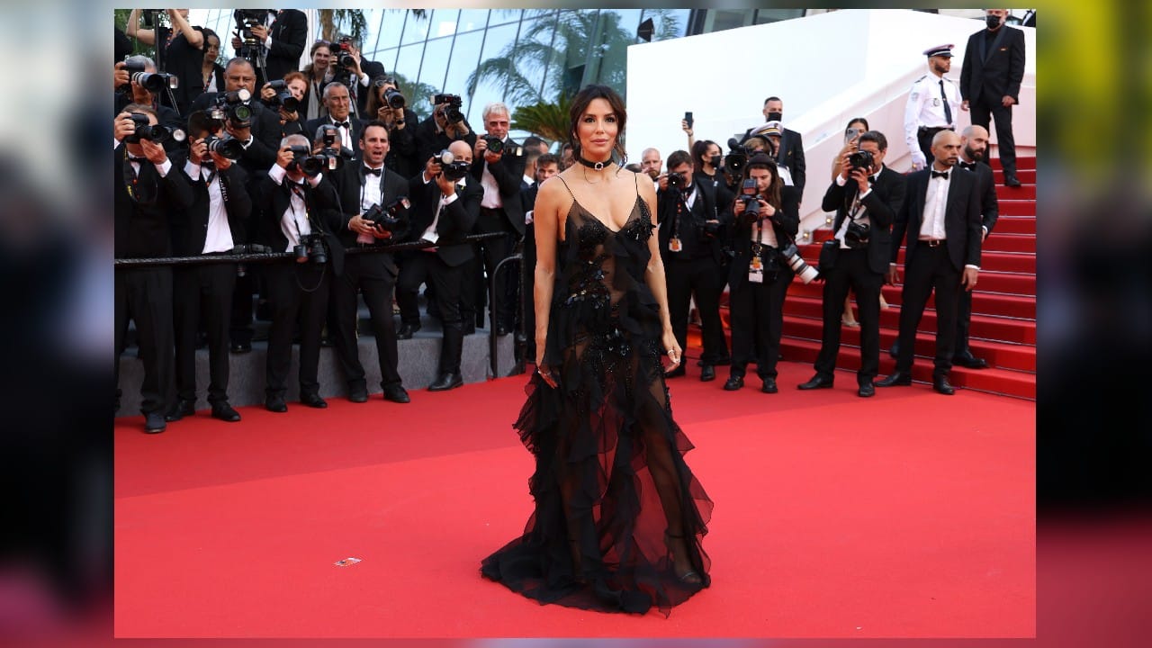 Eva Longoria poses for photographers upon arrival at the opening ceremony. (Image: AP)