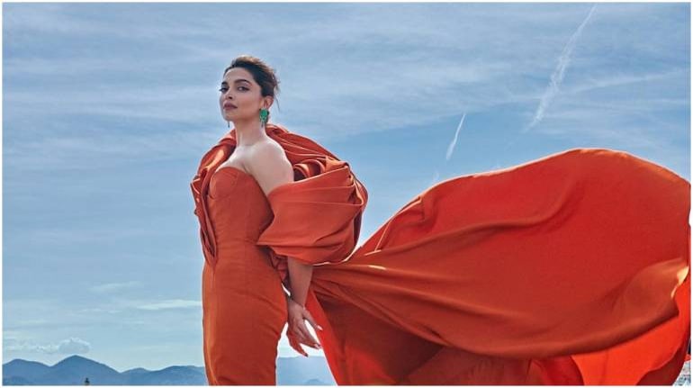 Deepika Padukone wore a custom red Louis Vuitton gown on the Cannes 2022  red carpet, Vogue India