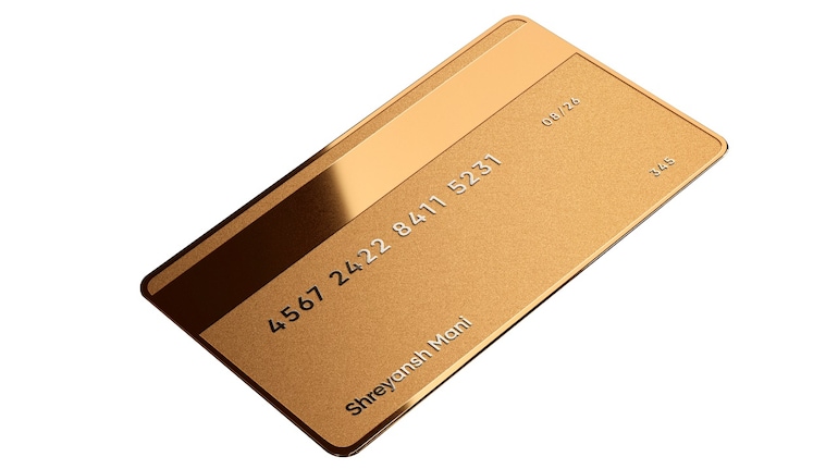 How is a gold-backed card different from a gold loan or a credit card?