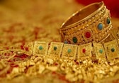 Gold climbs on safe-haven rush as banking rout grips markets