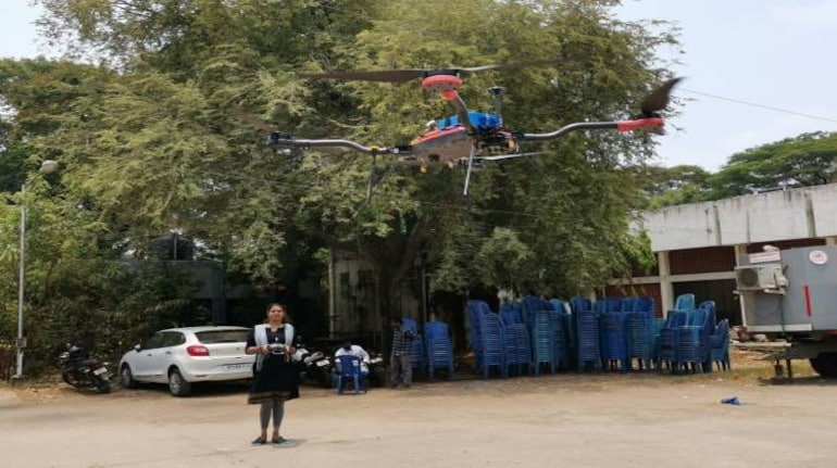 Maya Sree operating a drone Maya Sree operating a drone