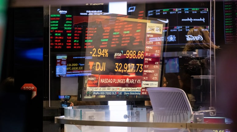 Stock market information on the floor of the New York Stock Exchange (NYSE) in New York, U.S., on Friday, April 29, 2022. Technology stocks extended losses Friday as shares of what were once market darlings at the height of the pandemic headed for their worst monthly drop since the great financial crisis. Photographer: Michael Nagle/Bloomberg