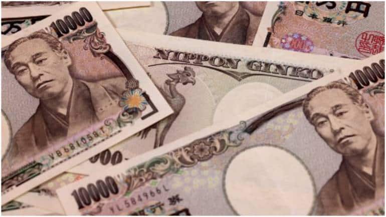 Yen slides 1.9% from 2-week high after BOJ sticks to stimulus