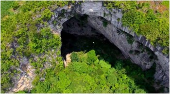 China's Guangxi Zhuang Autonomous Region has many massive sinkholes. (Representational image credit: Screengrab from video tweeted by @DiscoverGuangxi)·