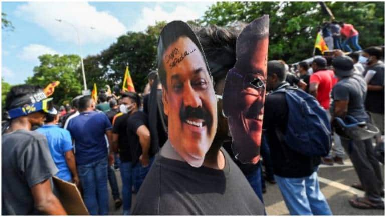 Video: Crowds boo at Sri Lankan PM on rare public outing- Moneycontrol.com