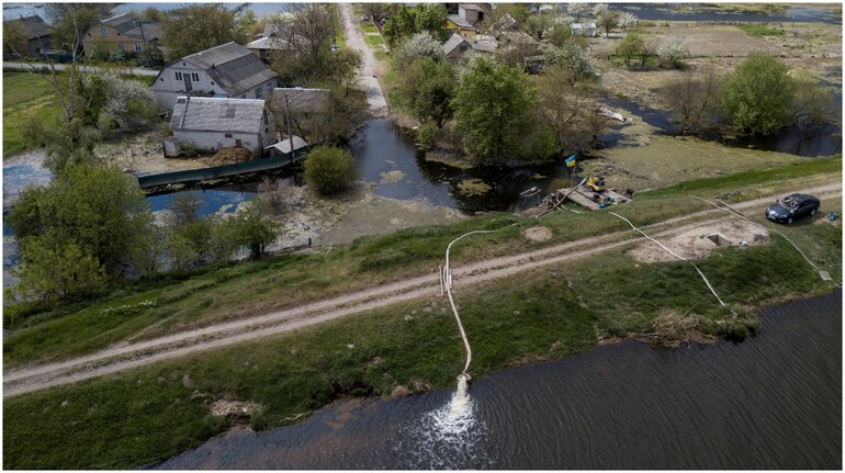 A water pump station is seen at a flooded area after Ukrainian military forces opened a dam to flood an residencial area in order to stop advance of Russian forces. A water pump station is seen at a flooded area after Ukrainian military forces opened a dam to flood an residencial area in order to stop advance of Russian forces.