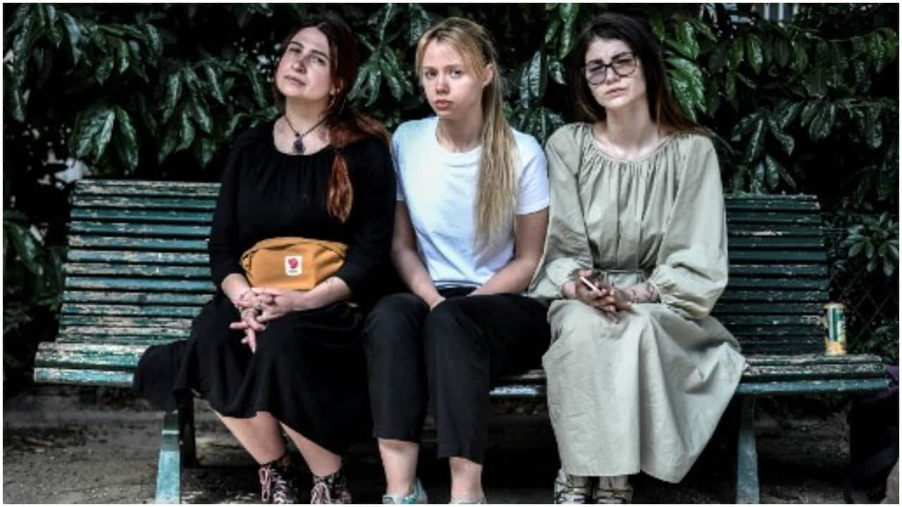 Ukrainian partners of Azovstal's soldiers of Marioupol, Olha Andrianova, Katerina Prokopenko and Hanna Naumenko pose during a photo session on May 15, 2022 in Paris. 