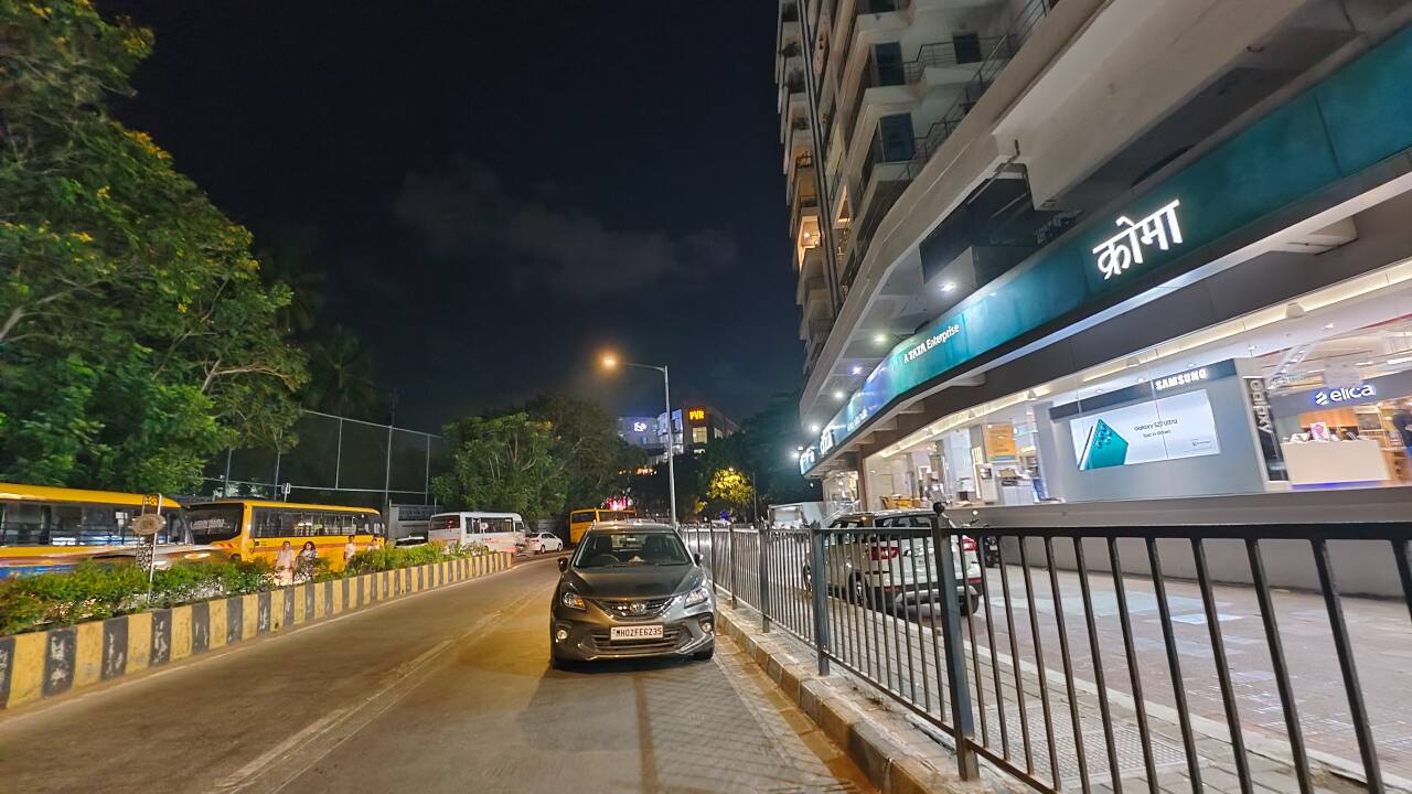 The ultrawide shooter also works well at night, but you’ll require some ambient light to get good results. However, it doesn’t handle background images as well as the main sensor. 