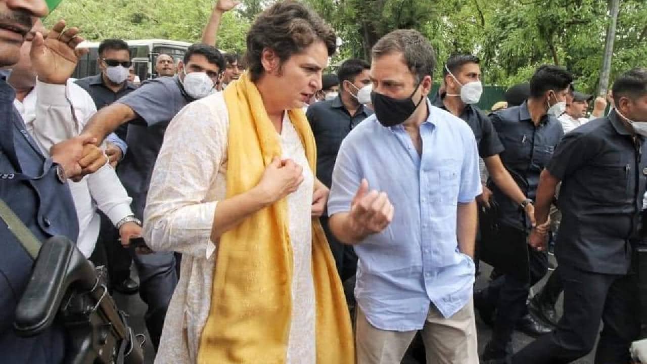 The Congress leader surrounded by hundreds of party workers marched to the ED office to appear before the agency from party headquarters, including his sister and party leader Priyanka Gandhi Vadra. (Image: Twitter @INCIndia)