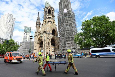  Emergency crews work at the site after a car crashed into a group of people, injuring dozens and killing at least one, at Tauentzien Strasse near Kaiser Wilhelm Gedaedtniskirche church in Berlin, Germany June 8, 2022. REUTERS/Fabrizio Bensch