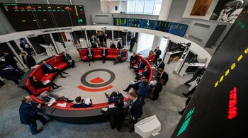Traders, brokers and clerks on the trading floor of the open outcry pit at the London Metal Exchange Ltd. (LME) in London, U.K., on Monday, Feb. 28, 2022. The turmoil unleashed in commodity markets by Russia's invasion of Ukraine worsened on Monday as LNG orders were paused, finance for trade in raw materials dried up and Black Sea wheat sales froze.