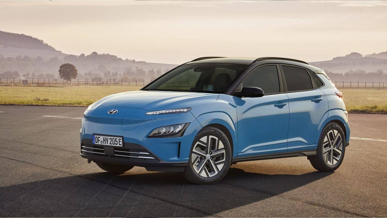 Hyundai Kona Electric | First launched in India back in 2019, the Hyundai Kona Electric became the first electric car to grace our markets from a mainstream manufacturer. In 2020, the Kona Electric received its first facelift internationally. The car is now bound for our shores once again and this means a host of changes and upgrades. For starters, the Kona Electric receives a new design complete with an overhauled front fascia. The front grille has been removed now and the Kona looks like the EV it was born to be. Headlamps have been sharpened and the cladding has been toned down with body coloured wheel arches and a new set of alloys. Mechanically, the Kona will remain unchanged. The current Kona in India is powered by a 39.2 kWh battery paired with a 136 hp motor providing a range of 304 km on a single charge. Globally, however, the SUV also gets a larger 64 kWh battery pack paired with a 204 hp motor. This variant allows for a total range of 483 km. Whether Hyundai decides to bring in this variant is yet to be seen but we should be able to see the interior updates similar to the international spec Kona. (Image: Hyundai)