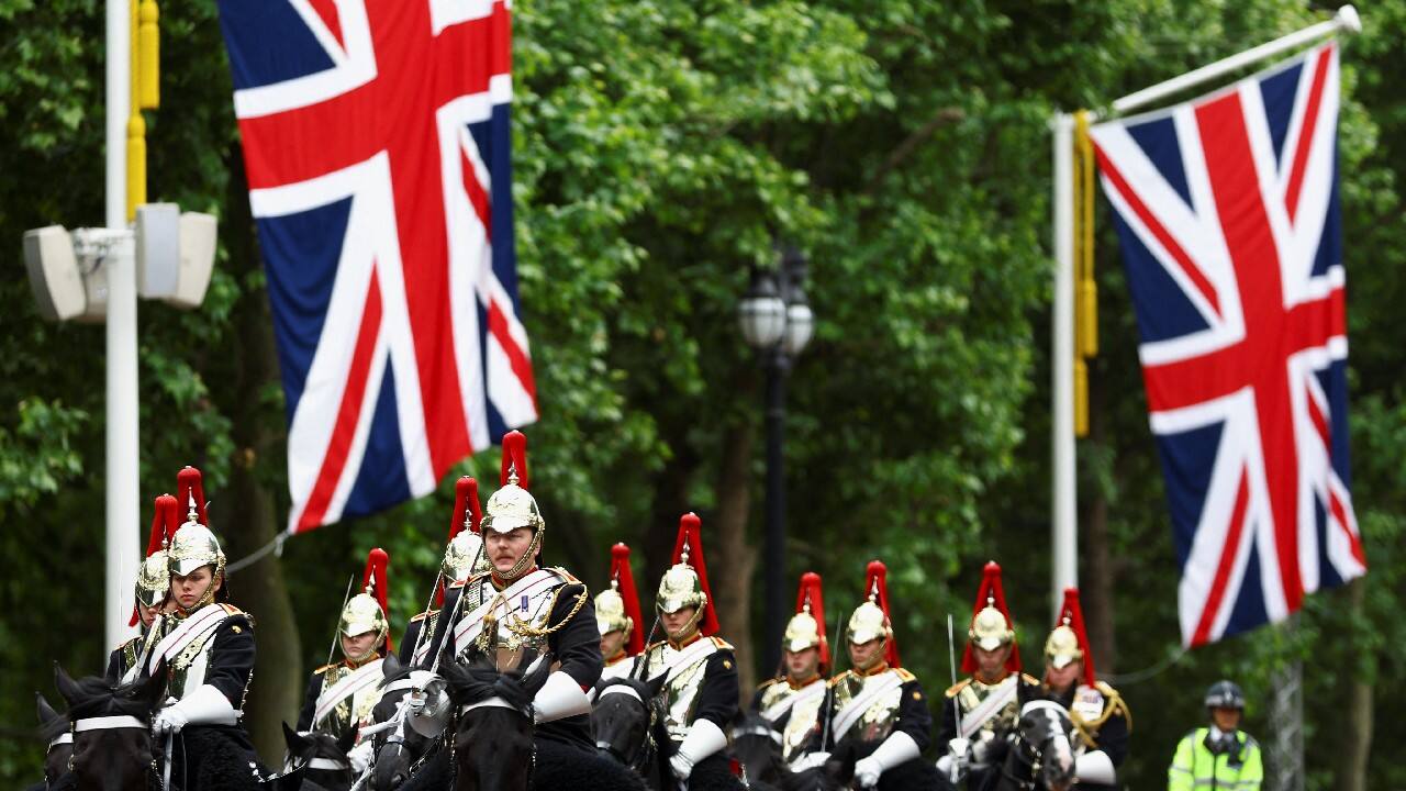 Members of the Household Cavalry ride along The Mall, ahead of the Queen's Platinum Jubilee, in London, Britain, June 1. (Image: Reuters)