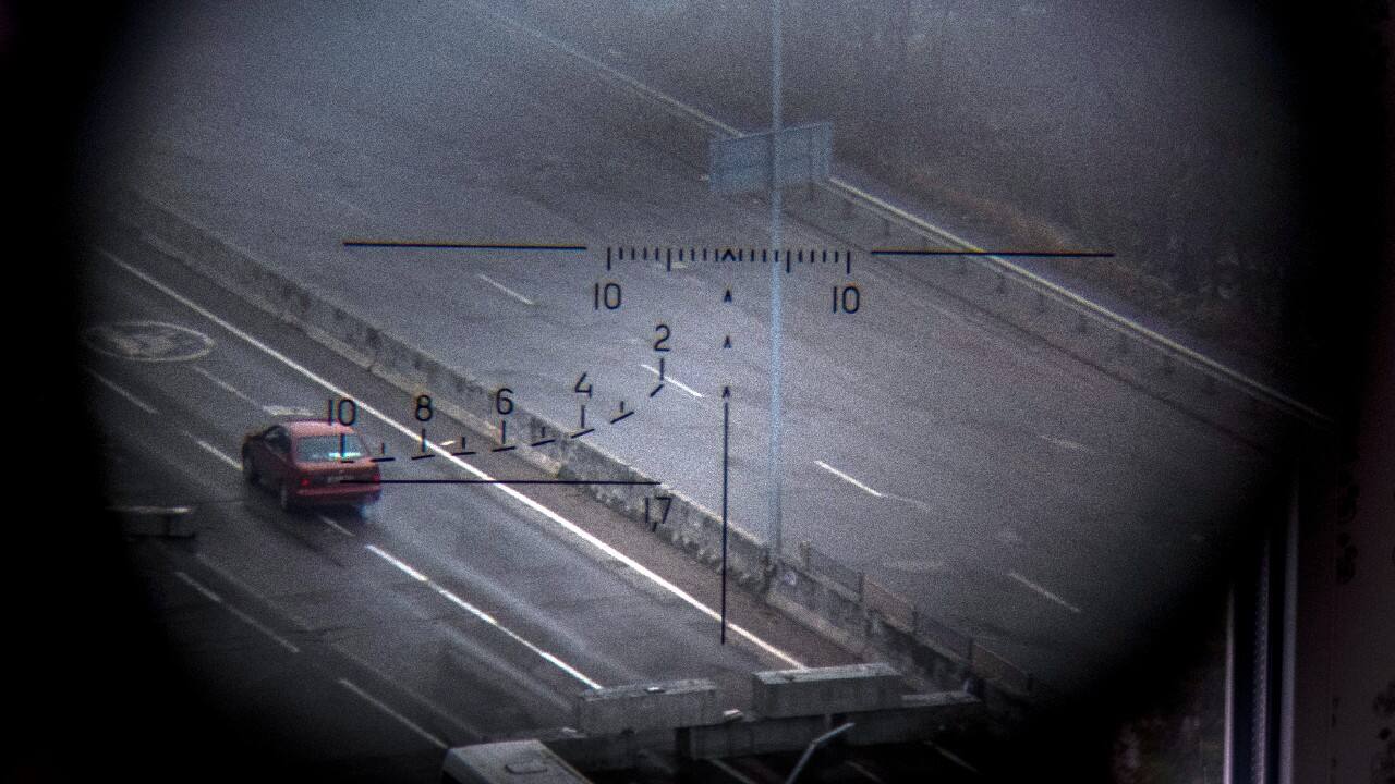 They have shown us a chilling view of a car driving down a highway, through the sight of a Ukrainian sniper. (Image: AP)