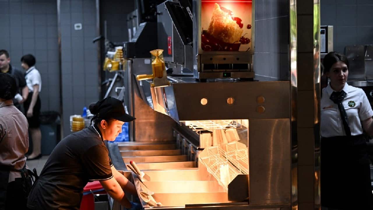 &quot;My whole family went... three times to McDonald's for a farewell meal,&quot; Elena, a programmer and mother of two, told AFP. &quot;Now we're going for a reunion lunch,&quot; she smiled. (Image: AFP)