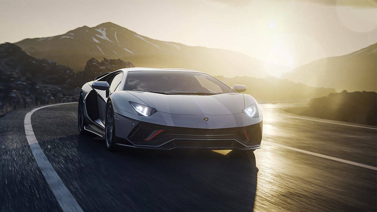 Now, with the ongoing electric revolution around the world, the gas-guzzling engines are being replaced with more fuel-efficient turbo-charged engines. It is likely we will see some form of the V12, just like that, but it will also be battery assisted, which means a hybrid. This will obviously lower power figures, but hey, electric progress is something we would like to route for. As for the roadster that India finally got, like we mentioned, there is only one available. The company built 350 unit of the coupe variant and 250 units of the roadster variant, 15 of which are at the bottom of the sea thanks to a shipping accident. The one, and only one, that has finally made its way to Indian shores is sitting pretty in Lamborghini’s showroom in Delhi. The company hasn’t given any price tag at the moment, but we can estimate an on-road cost of roughly Rs 7-8 crore. (Image: Lamborghini)