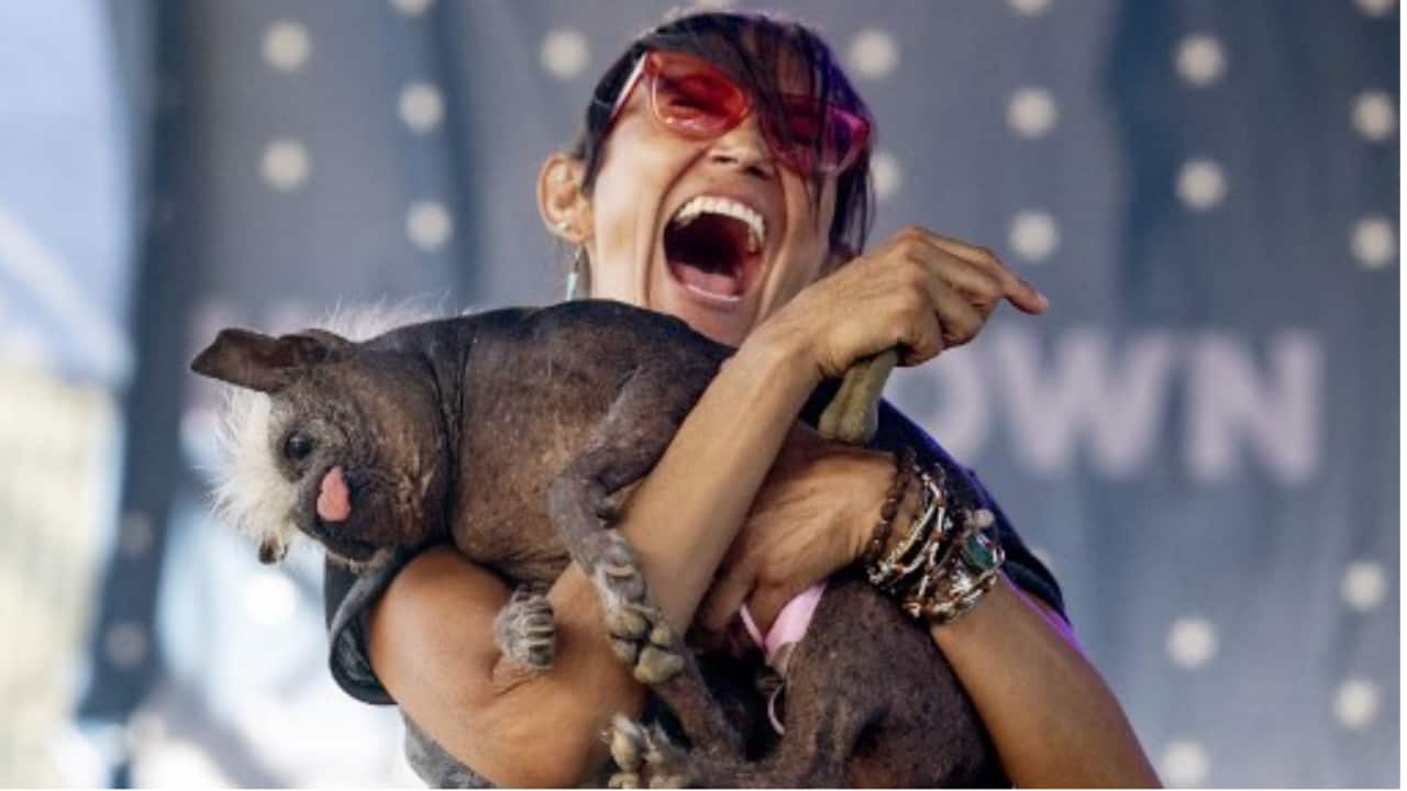 Jeneda Benally celebrates as her dog Mr Happy Face wins the World's Ugliest Dog Competition in Petaluma, California on June 24.