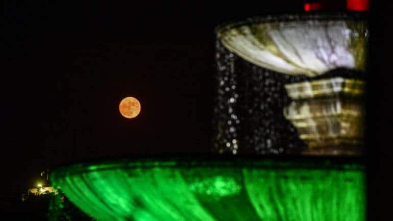 Biggest supermoon of 2022 lights up night skies around world