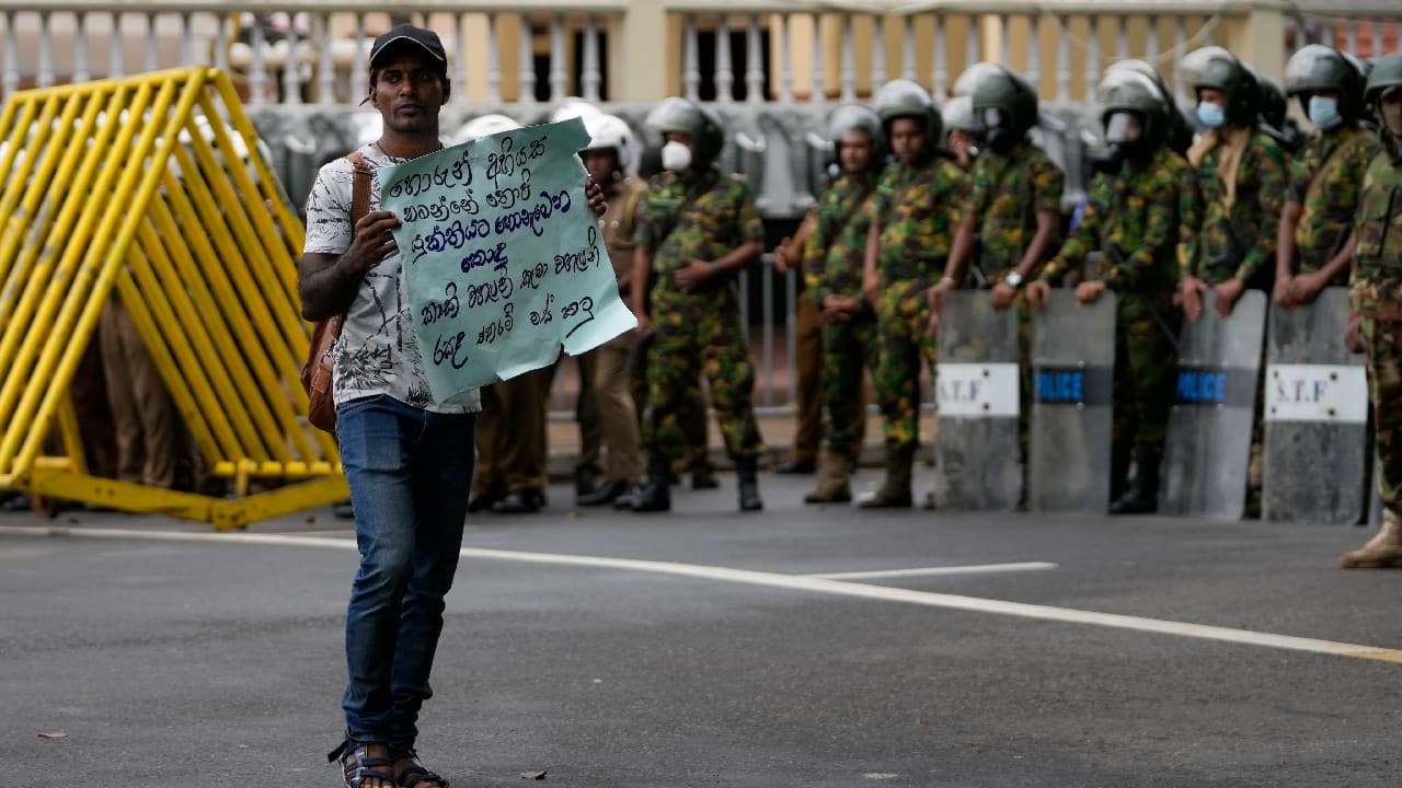 Parliament's selection goes against the “will of the people,&quot; said Jeewantha Peiris, a protest leader and Catholic priest, adding that demonstrations against Wickremesinghe would continue. (Image: AP)