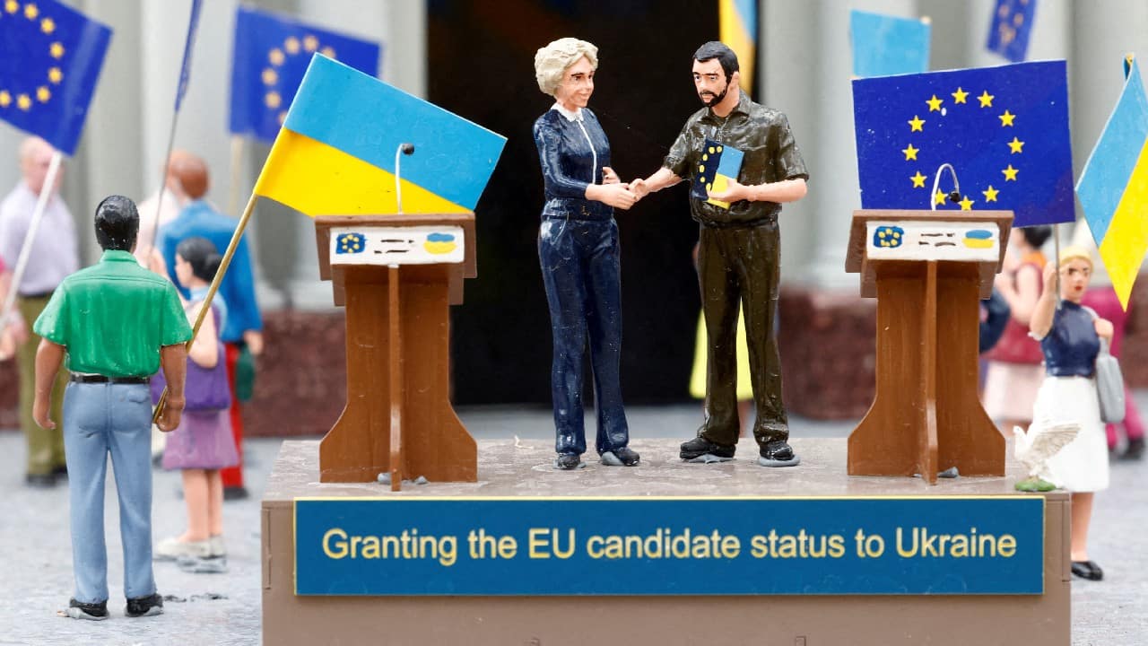 Miniature models depict European Commission President Ursula von der Leyen shaking hands with Ukraine's President Volodymyr Zelenskiy, surrounded by people with European and Ukrainian flags celebrating outside the Independence Monument in Kyiv's Maidan Square, at The &quot;Mini-Europe&quot; theme park in Brussels, Belgium July 27. (Image: Reuters)