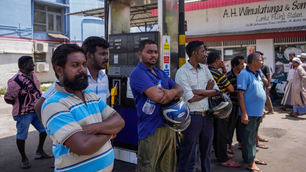 Cash-strapped Sri Lanka on July 3 extended school closures for one week because there isn't enough fuel for teachers and parents to get children to classrooms, and the energy minister appealed to the country's expatriates to send money home through banks to finance new oil purchases. (Image: AP)