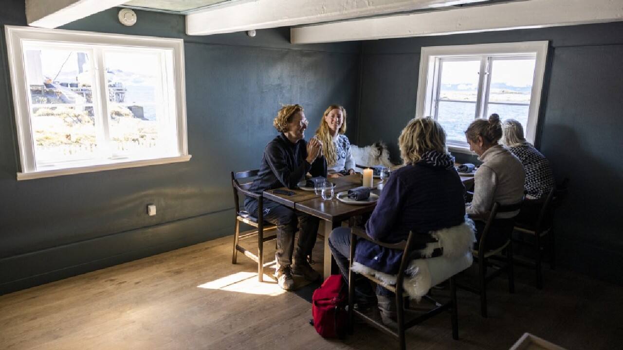 Housed in a narrow black wooden house, one of the oldest in Greenland, the restaurant can only accommodate about 20 people per service, and experiments with local produce, including whale and seaweed, with fresh produce almost impossible to find in the harsh climate. (Image: AFP)