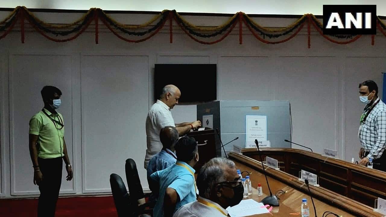 Delhi Deputy CM Manish Sisodia casts his vote at the Assembly. (Image: Twitter @ANI)
