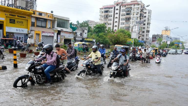 In pics | Heavy rains continue to lash several states; red alert in ...