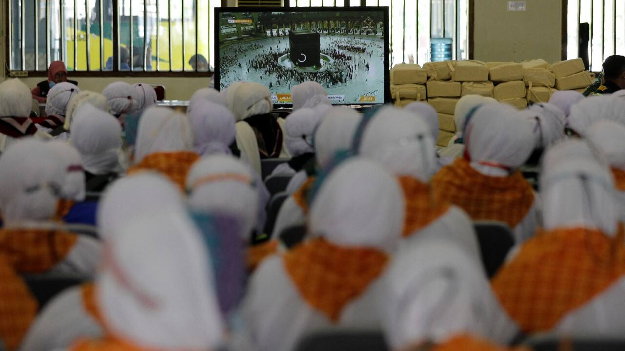 Sutrisno, 54, and Sri, 51, are joyful at undertaking the haj in the place of Sri's parents but they are saddened by the loss of Sri's father and the possibility her mother will never complete the pilgrimage. (Image: Reuters)