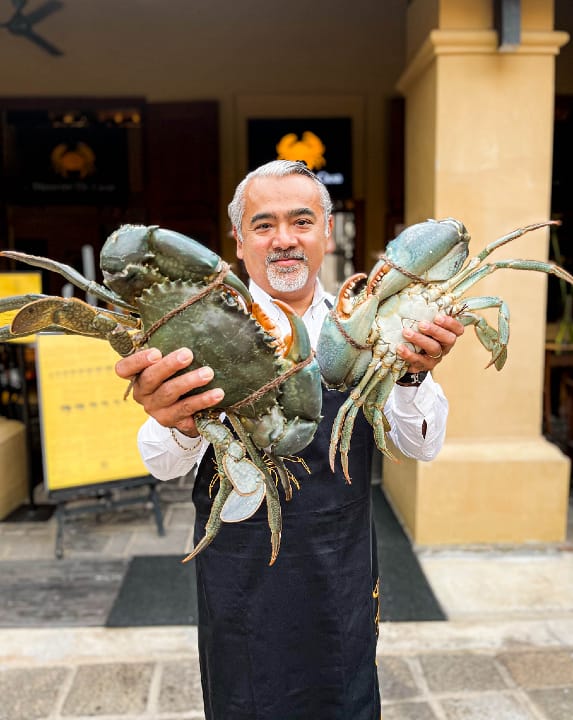 Chef Dharshan Munidasa with his pet project - the crabs