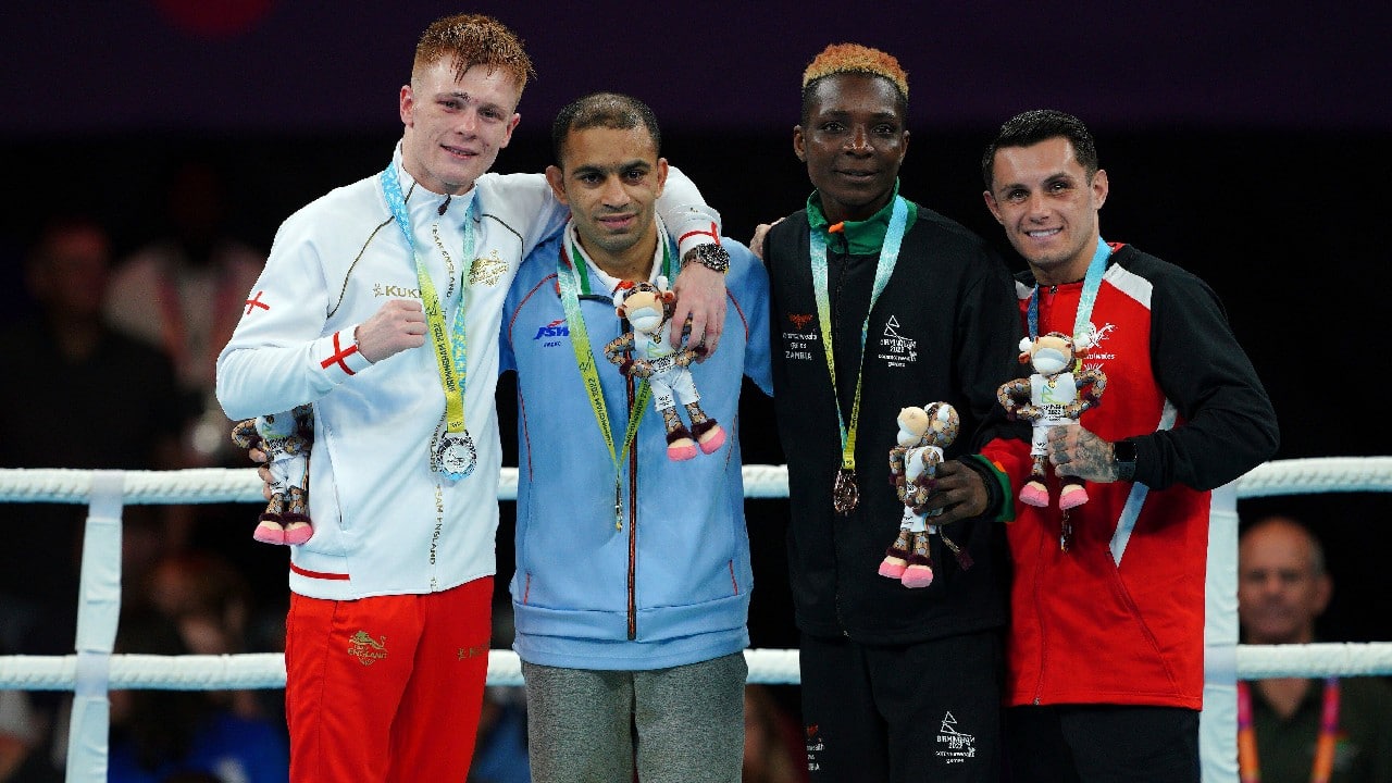 England's Kiaran MacDonald, Silver, India's Amit, gold, Zambia's Patrick Chinyemba, bronze and Wales' Jake Dodd, bronze, from left, after the Men's Fly (48-51kg) boxing final at The NEC on day ten of the 2022 Commonwealth Games in Birmingham, England, August 7. (Image: AP)