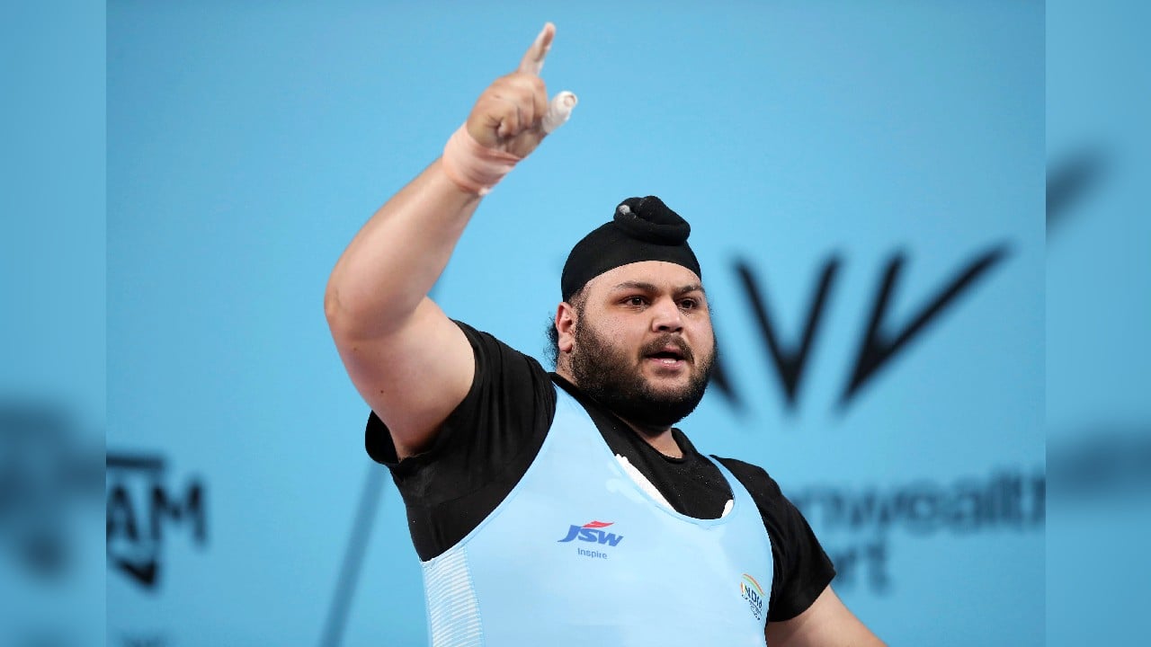 Gurdeep Singh celebrates after winning a bronze medal during the Men's 109kg weightlifting final at The NEC on day six of the 2022 Commonwealth Games in Birmingham, England, August 3. (Image: Reuters)