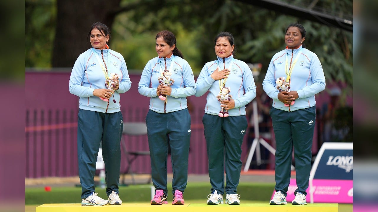 Lovely Choubey, Pinki Kaushik Singh, Nayanmoni Saikia and Rupa Rani Tirkey celebrate the historic victory in the Women's Fours Lawn Bowls final, at Victoria Park on day five of the 2022 Commonwealth Games in Birmingham, England, August 2. (Source: AP)