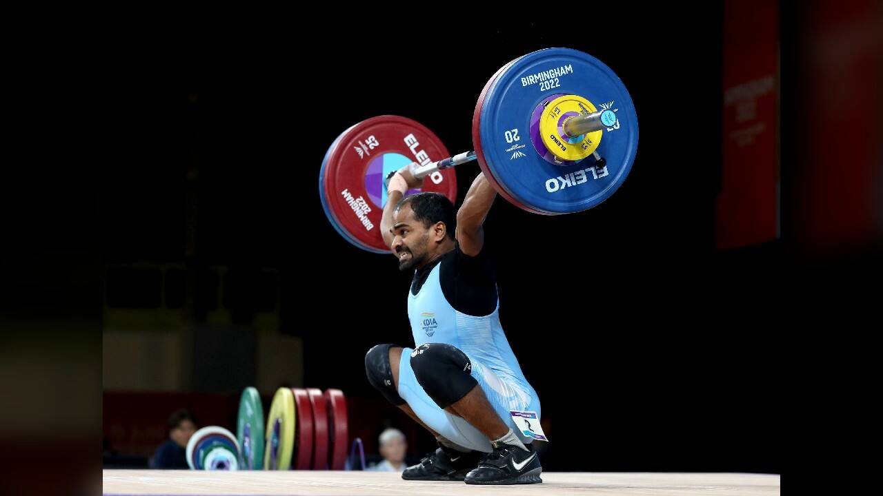 Gururaja Poojary took bronze in Mens 61kg weightlifting at The NEC on day two of the Commonwealth Games in Birmingham, England, July 30 and was thrilled to add to his silver medal from the games in 2018. Gururaja broke his personal best record to lift 151kg in third attempt. (Image: AP)