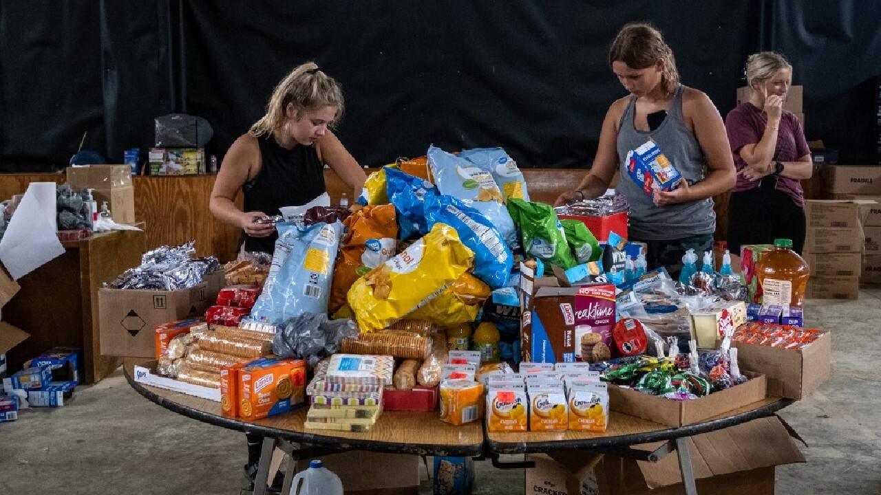 Some 35 miles (55 kilometers) south in the tiny community of Buckhorn, volunteers at a distribution center told AFP that 700 to 800 people had come through on July 31 alone to collect donated supplies ranging from food to paper towels and toiletries. (Source: AFP)