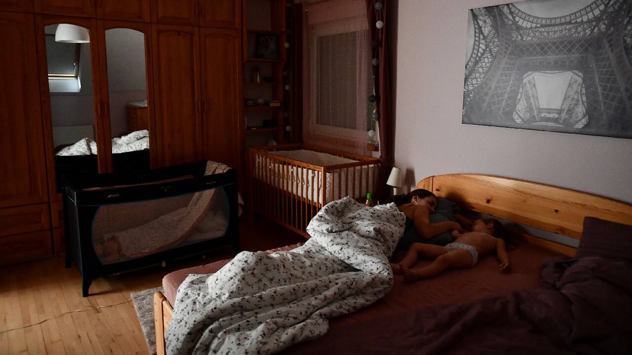 But the rules for conservation of old buildings in Budapest's historic center make installing air conditioning impossible. So the owners of the otherwise prized apartments there spend their days in darkened rooms, in front of electric fans. (Image: AP)