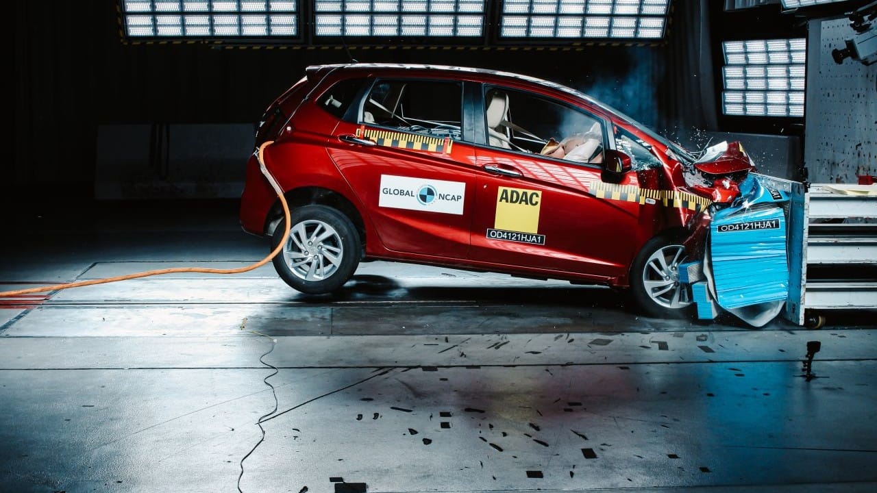 Honda Jazz | 4 stars | The other Honda car to secure four stars is the Honda Jaz with a total score of 13.89 out of 17 points. Child protection was rated at 31.54 points out of 49 and while the Jazz does not come with ISOFIX anchors, both the 1.5-year old and 3-year-old child seats were installed using the adult seatbelts. This still allows for a safety rating of three stars. As for the adult occupants, the passenger sees good protection overall with adequate protection to the left tibia and only marginal protection to both knees. The driver’s chest and tibias see adequate protection while the knees receive marginal protection. The tested Honda Jazz features dual airbags and ABS with EBD, but no seatbelt pretensioners or ISOFIX anchors. The body shell remained stable in the 64 km/h crash and was capable of further loadings. The Honda Jazz gets a few more safety features such as speed-sensing door lock, seatbelt reminders, high-speed alert and rear parking sensors with a multiview reverse camera. The Honda Jazz is powered by a single 1.2-litre 4-cylinder petrol engine capable of producing 90 hp of maximum power at 6,000 rpm and 110 Nm of peak torque at 4,800 rpm. Transmission options include a 5-speed manual and a 7-speed CVT automatic. Prices for the Honda Jazz start at Rs 8.01 lakh, ex-showroom. (Image: Honda) Honda Jazz | 4 stars | The other Honda car to secure four stars is the Honda Jaz with a total score of 13.89 out of 17 points. Child protection was rated at 31.54 points out of 49 and while the Jazz does not come with ISOFIX anchors, both the 1.5-year old and 3-year-old child seats were installed using the adult seatbelts. This still allows for a safety rating of three stars. As for the adult occupants, the passenger sees good protection overall with adequate protection to the left tibia and only marginal protection to both knees. The driver’s chest and tibias see adequate protection while the knees receive marginal protection. The tested Honda Jazz features dual airbags and ABS with EBD, but no seatbelt pretensioners or ISOFIX anchors. The body shell remained stable in the 64 km/h crash and was capable of further loadings. The Honda Jazz gets a few more safety features such as speed-sensing door lock, seatbelt reminders, high-speed alert and rear parking sensors with a multiview reverse camera. The Honda Jazz is powered by a single 1.2-litre 4-cylinder petrol engine capable of producing 90 hp of maximum power at 6,000 rpm and 110 Nm of peak torque at 4,800 rpm. Transmission options include a 5-speed manual and a 7-speed CVT automatic. Prices for the Honda Jazz start at Rs 8.01 lakh, ex-showroom. (Image: Honda)