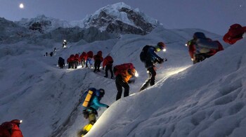 Climbers on ascent on Everest at dawn. (Image courtesy - Seven Summits)