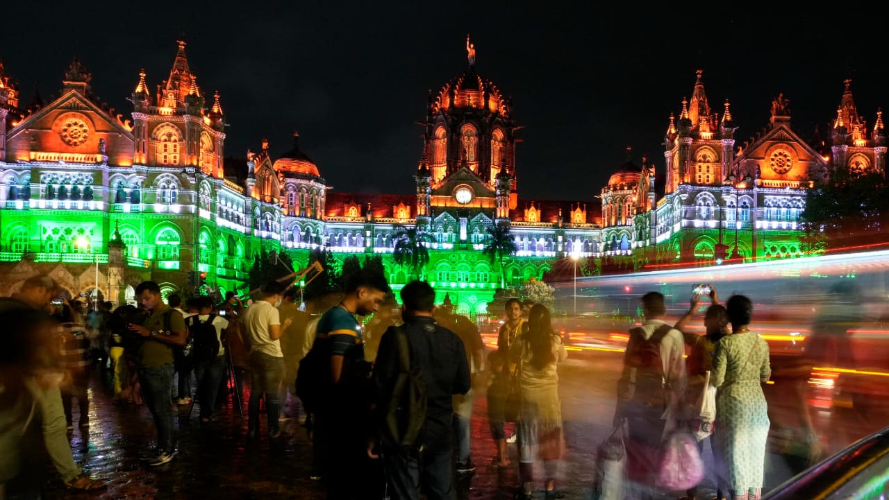 The iconic Chatrapati Shivaji Maharaj terminus in Mumbai is lit in the colors of the tricolor national flag.