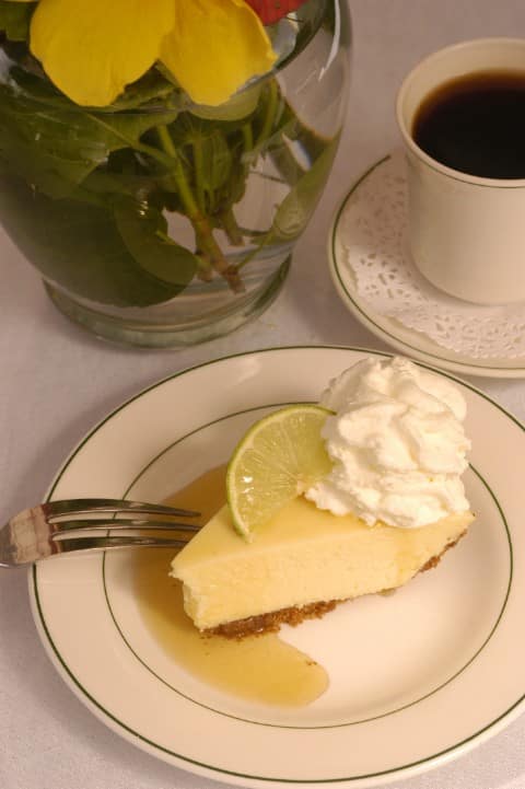A slice of Key lime pie is ready to be consumed at an eatery in Key West, Fla. The signature dessert of the Florida Keys' culinary experience is Key Lime pie. The pie filling's yellow color always proves its authenticity and its taste is an unique blend of sweetness and tartness.  Photo by Bob Krist/Florida Keys News Bureau courtesy Florida Keys Tourism Council)