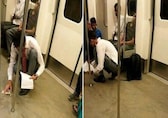 Social media praise for passenger seen cleaning Delhi metro floor