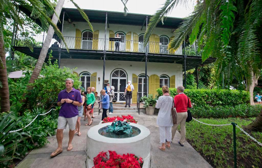 Visitors stroll on the entrance path of the Ernest Hemingway Home & Museum in Key West, Fla., Monday, Jan. 6, 2016. A facet of the prize for the winner of the Florida Keys Flash Fiction literary contest is the opportunity to spend up to 10 days writing in the same study that Hemingway utilized when he lived and wrote at the house in the 1930s. FOR EDITORIAL USE ONLY (Rob O'Neal/Florida Keys News Bureau/HO (Photo courtesy Florida Keys Tourism Council)