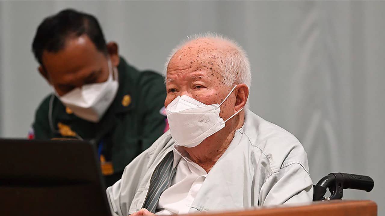 In this photo released by the Extraordinary Chambers in the Courts of Cambodia, Khieu Samphan, the former head of state for the Khmer Rouge, sits in a courtroom during a hearing at the U.N.-backed war crimes tribunal in Phnom Penh, Cambodia, September 22. The international court convened in Cambodia to judge the Khmer Rouge for its brutal 1970s rule ended its work Thursday after spending $337 million and 16 years to convict just three men of crimes after the regime caused the deaths of an estimated 1.7 million people. (Image: Nhet Sok Heng/Extraordinary Chambers in the Courts of Cambodia via AP)